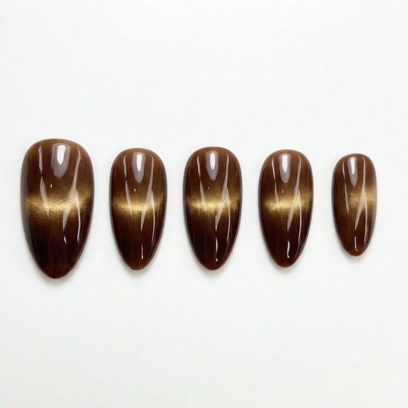 Press-on nail design uploaded to Try My Nails - brown cat-eye nails on white background